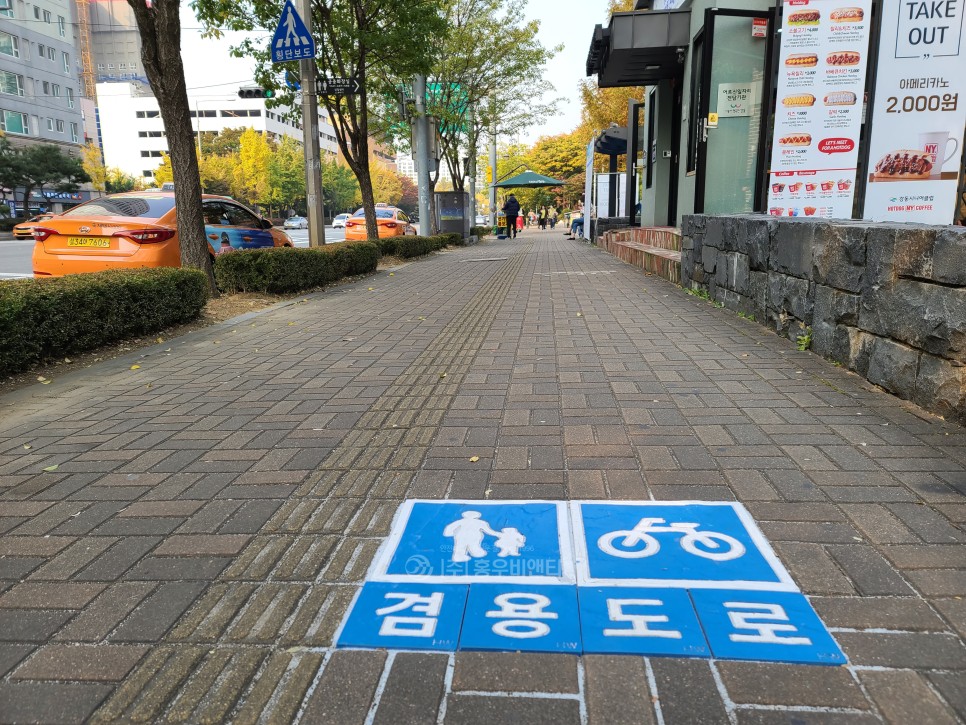 홍우비앤티_자전거_겸용도로_강동구_설치_후4.jpg